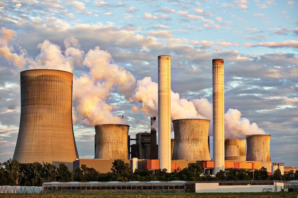 What are the different types of power plants used to generate energy?